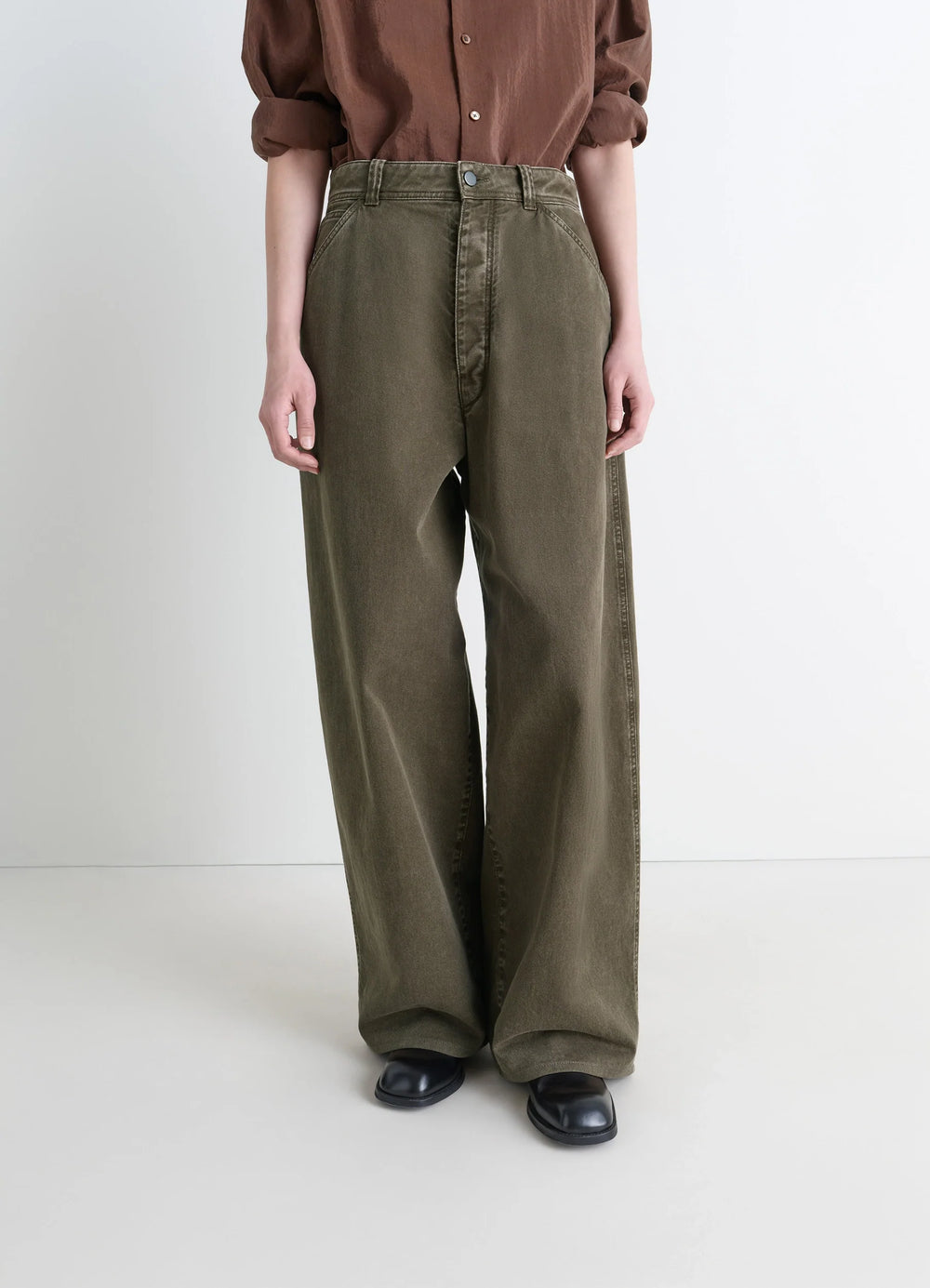 Lemaire Large Pants in Heather Garment Dyed Snow Denim, model shot, mid-length view high waist design