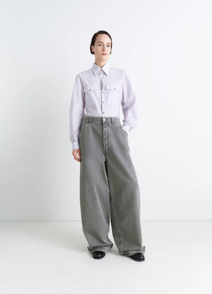 Lemaire Wide Leg Pants in Snow Garment Dyed Denim, model shot, front view wide leg, relaxed fit