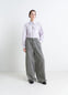 Lemaire Wide Leg Pants in Snow Garment Dyed Denim, model shot, front view wide leg, relaxed fit
