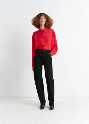 Lemaire Five Pockets Twisted Pants in Deep Black Wash Thick Denim, model shot, Front View Twisted Seams, Fitted Cut