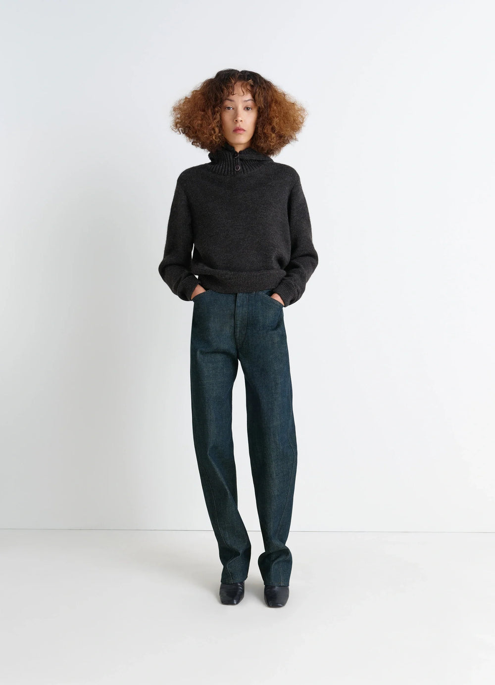 Lemaire Five Pockets Twisted Pants in Deep Indigo Thick Denim, model shot, front view twisted seams, relaxed fit