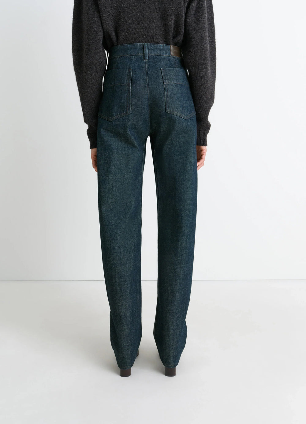 Lemaire Five Pockets Twisted Pants in Deep Indigo Thick Denim, model shot, back view high waist relaxed fit