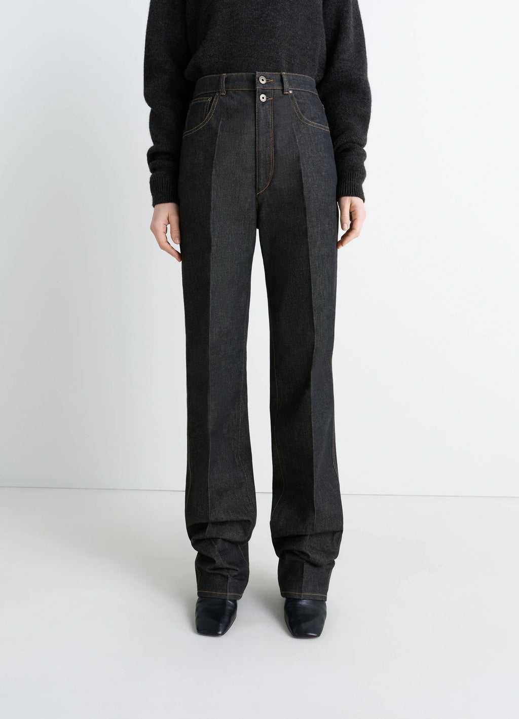 Lemaire High Waisted Straight Pants in Slate Denim, model shot, three-quarter view stacked hem detail