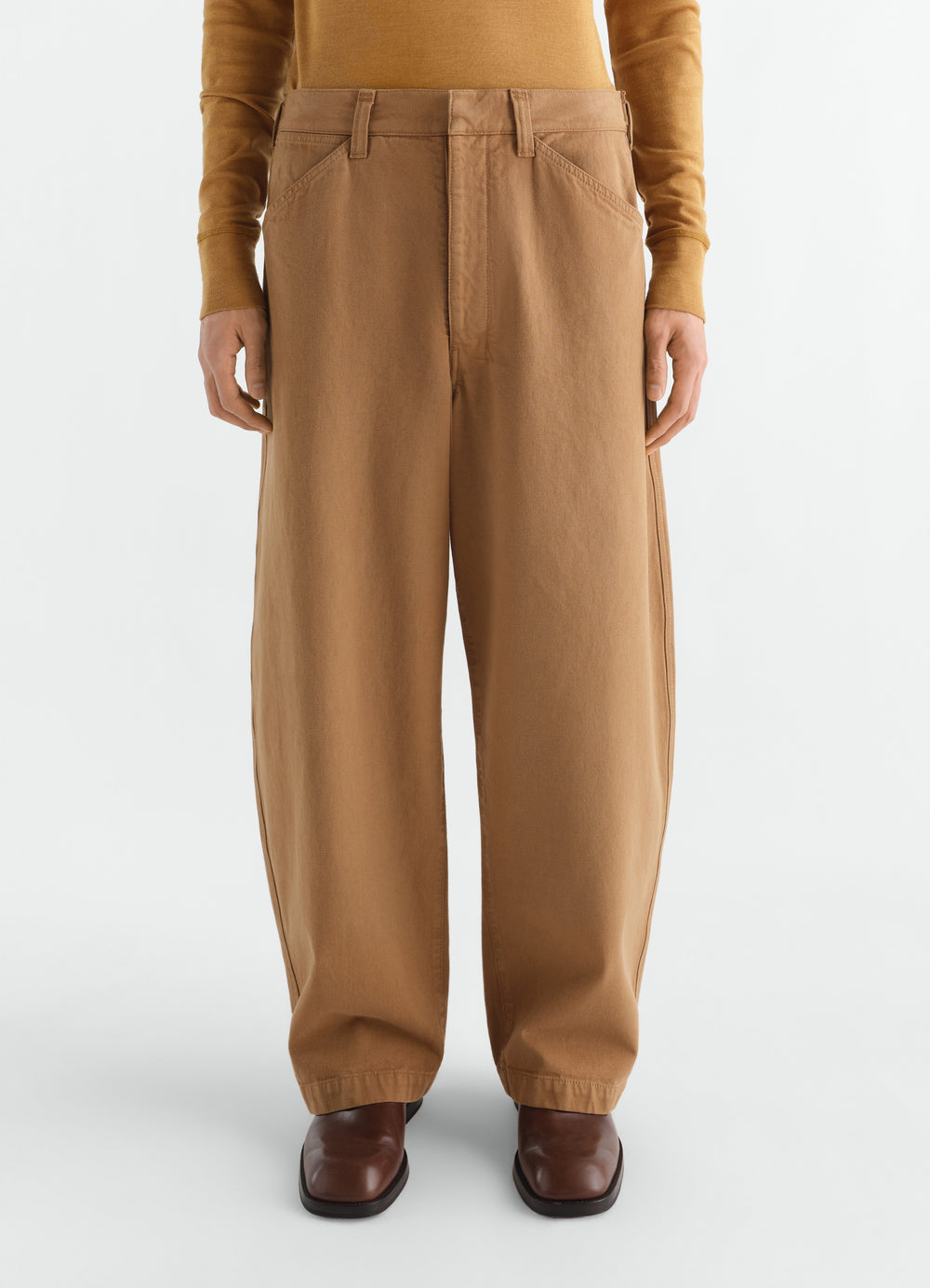 Oversized heavy garment-dyed broken twill pants in brown worn by model front view LEMAIRE