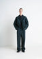 Lemaire Maxi Workwear Pants in Deep Indigo Thick Denim, model shot, Front view Oversized wide leg