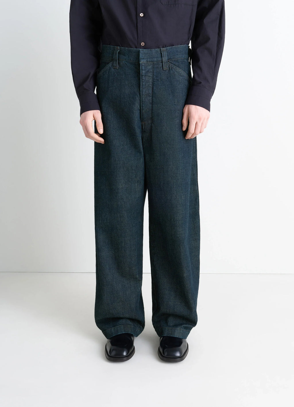 Lemaire Maxi Workwear Pants in Deep Indigo Thick Denim, model shot, full front view high waist fit