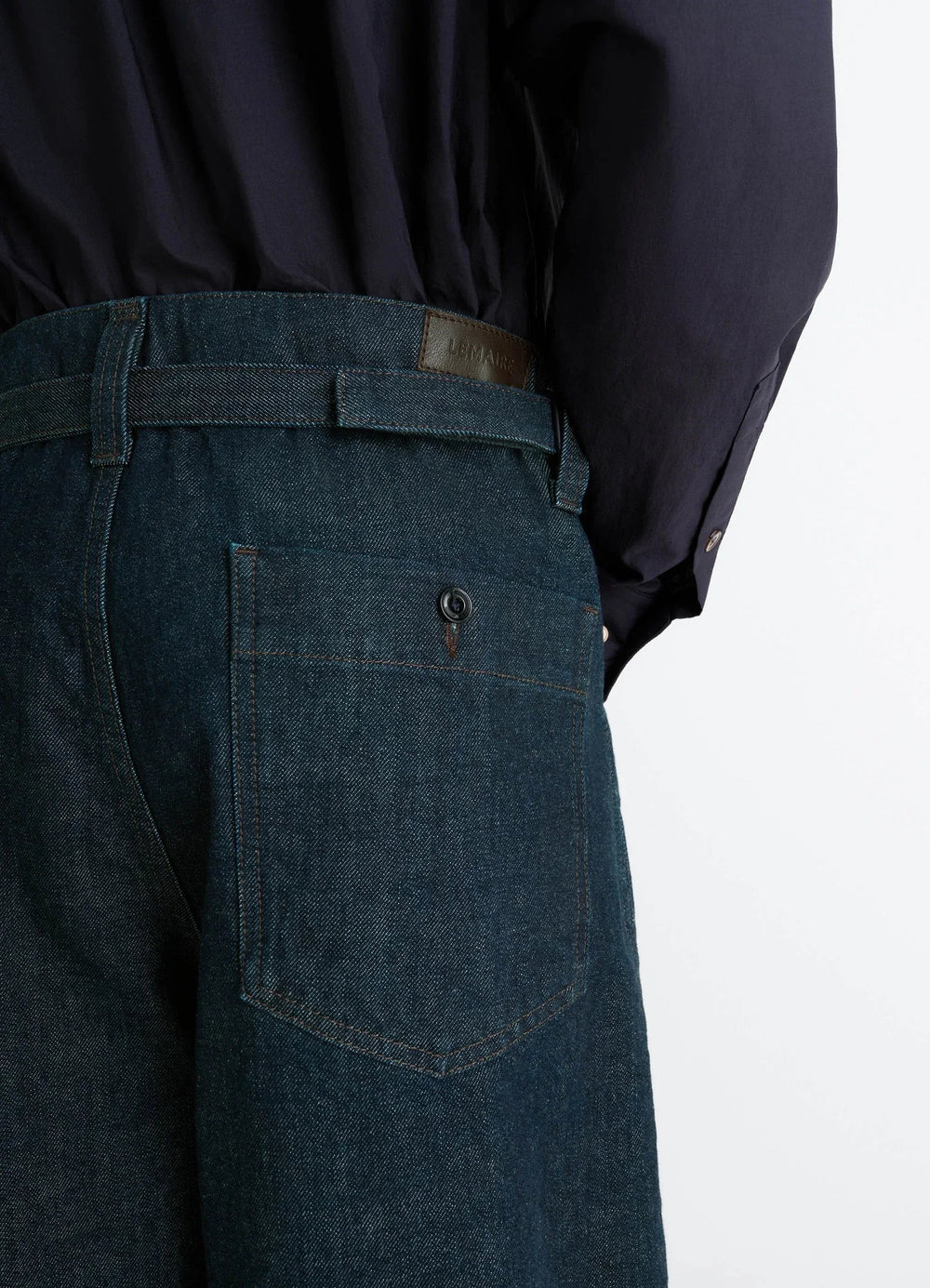 Lemaire Maxi Workwear Pants in Deep Indigo Thick Denim, model shot, rear close-up view back pocket detail