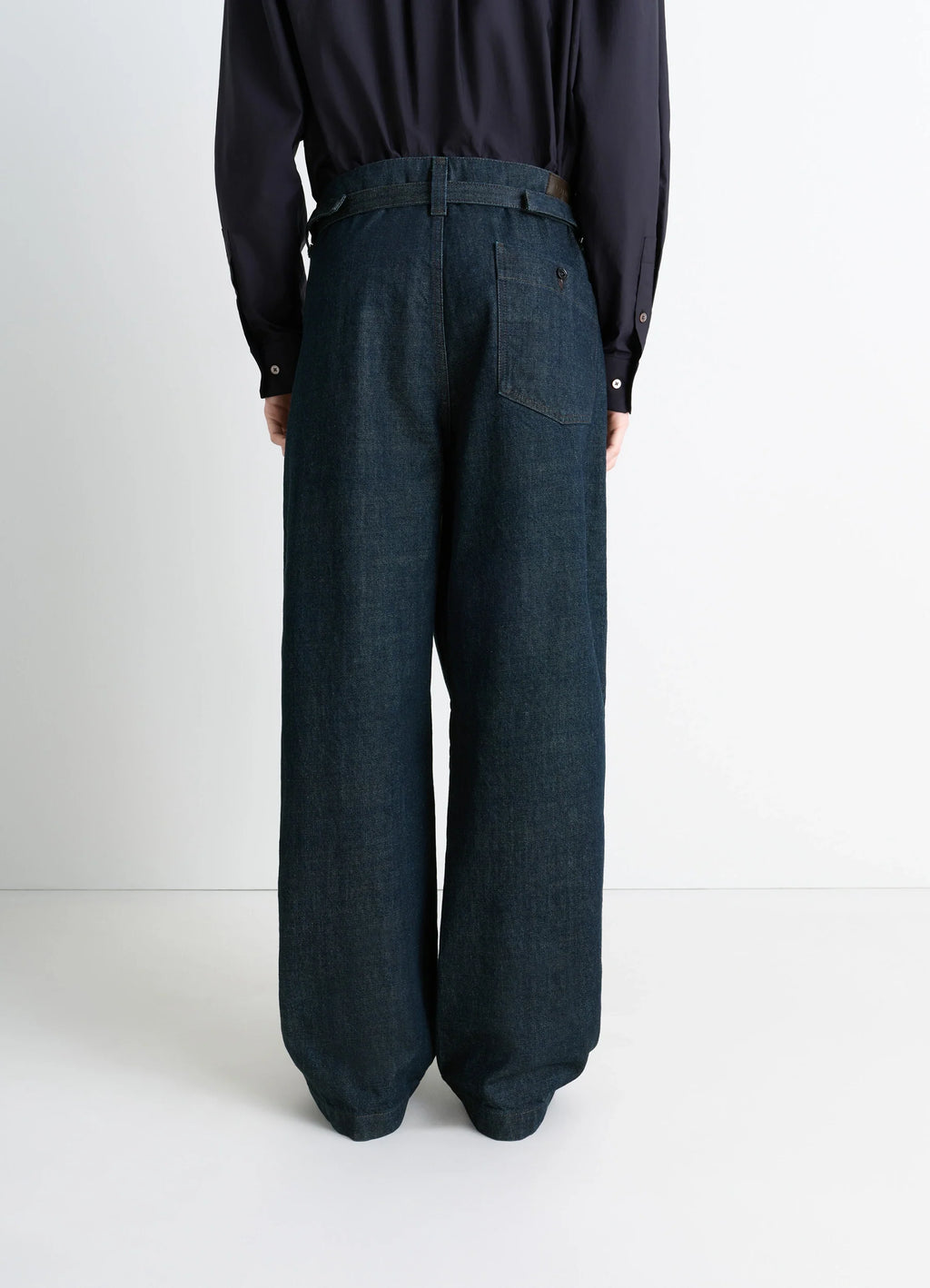 Lemaire Maxi Workwear Pants in Deep Indigo Thick Denim, model shot, back full view wide leg bottom hem