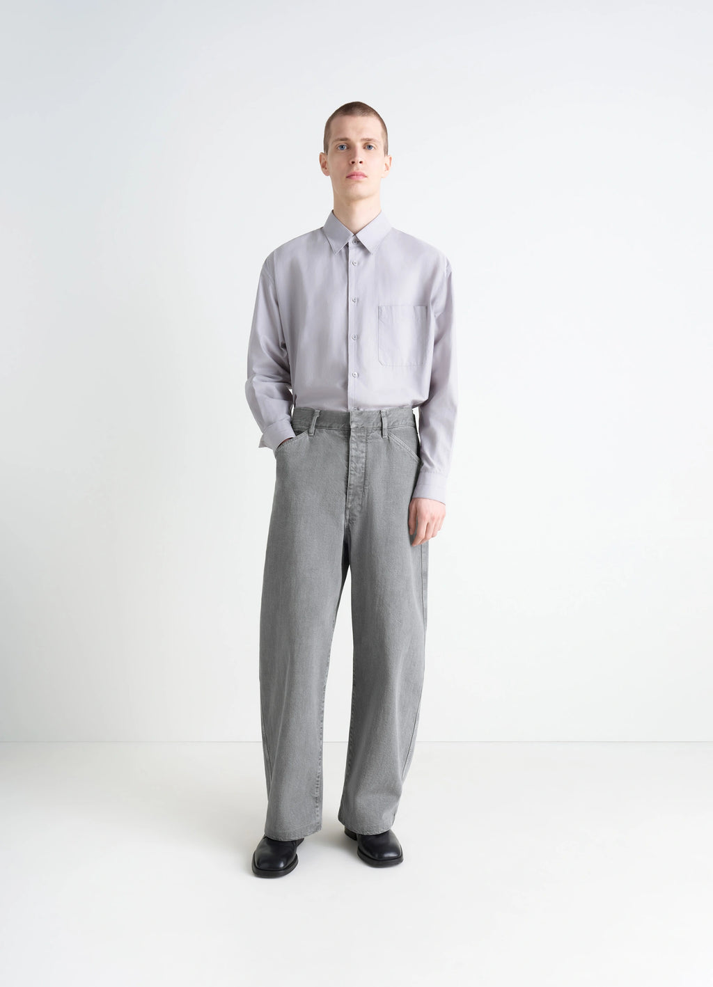 Lemaire Maxi Workwear Pants in Heather Garment Dyed Snow Heavy Den, model shot, front view oversized wide leg