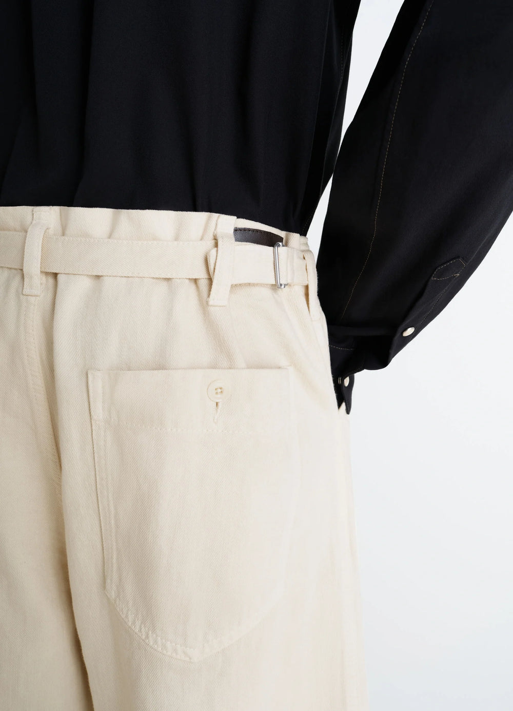 Lemaire Maxi Workwear Pants in Heather Garment Dyed Denim, model shot, back detail shot belted high waist