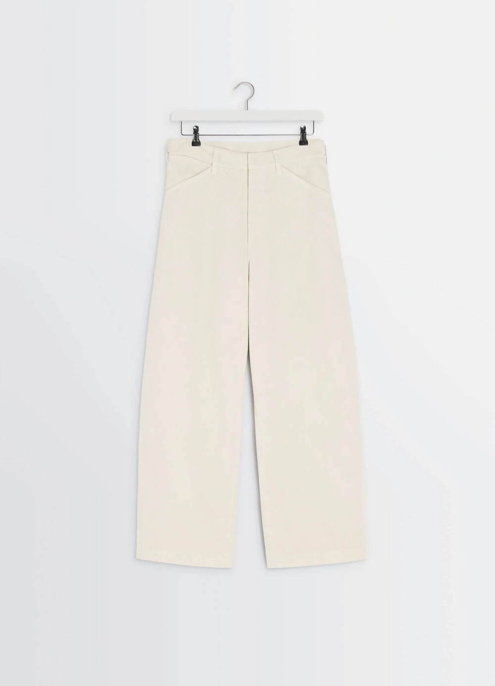 Lemaire Maxi Workwear Pants in Heather Garment Dyed Denim, product shot, hanging front view straight wide leg hanging