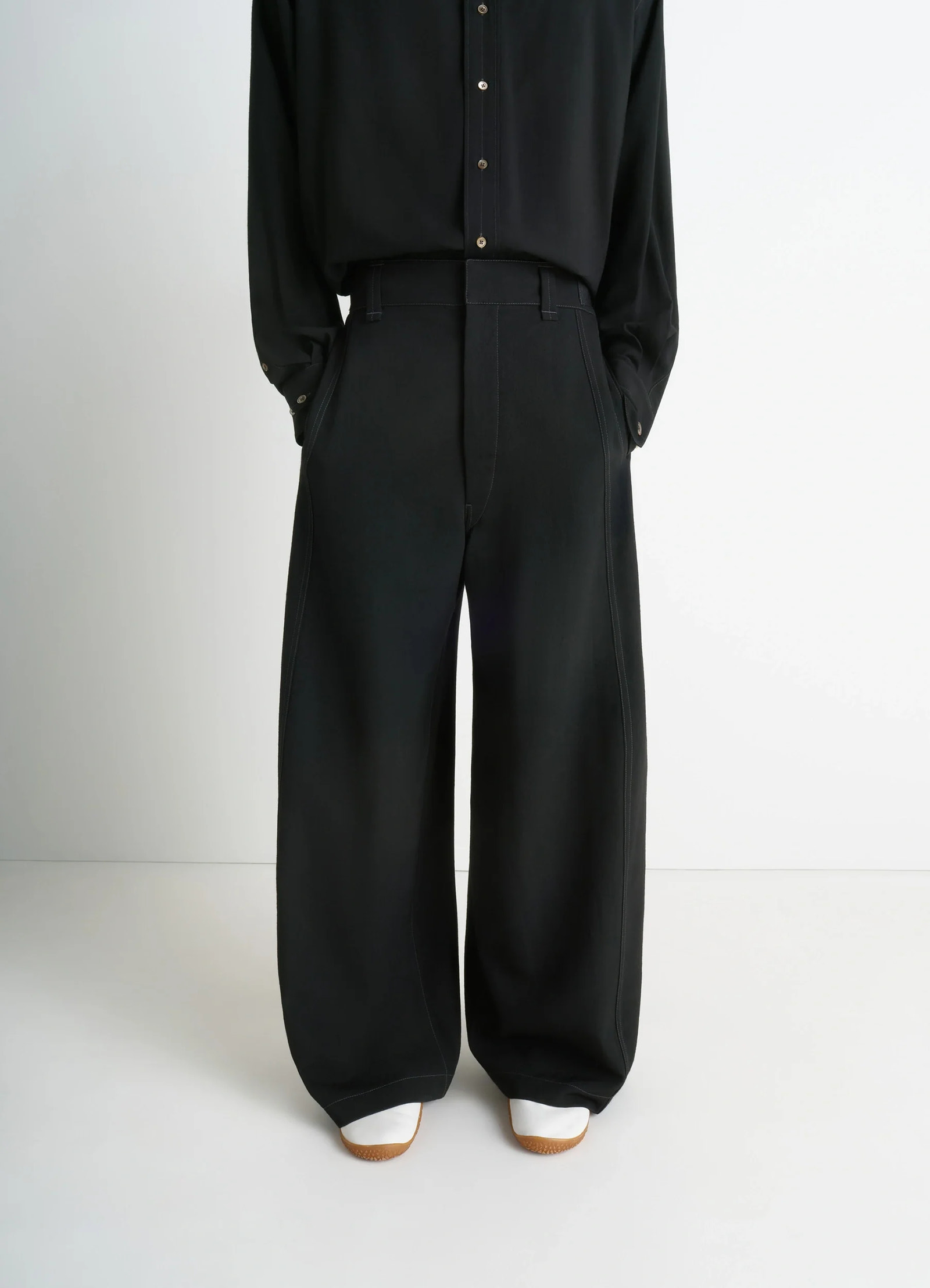 Maxi utility pants in soft wool twill, model shot, side view adjustable buckle tabs