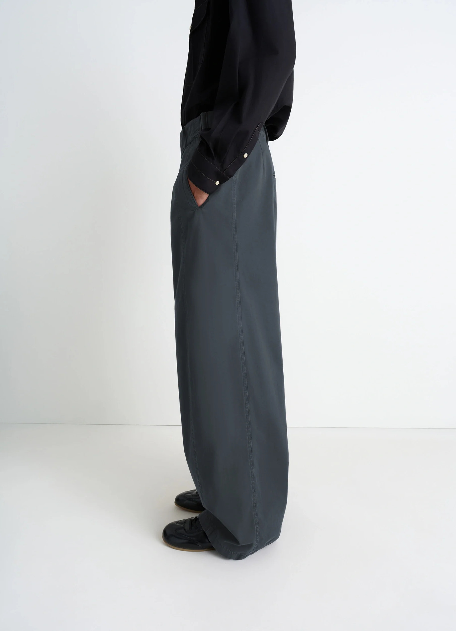 Maxi utility pants in garment dyed compact cotton twill, model shot, profile view relaxed fit with pockets
