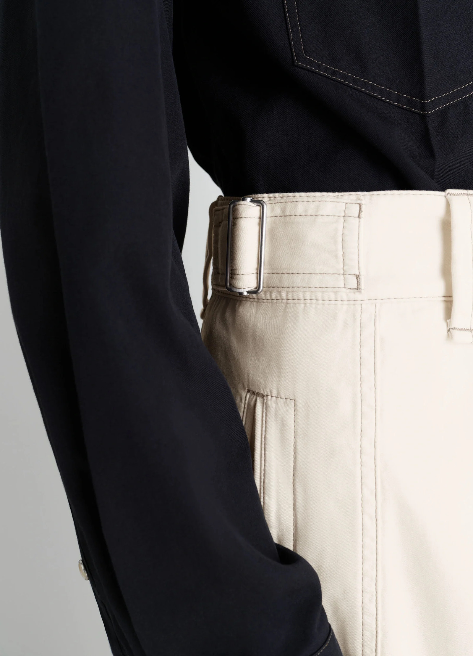 Maxi utility pants in garment dyed compact cotton twill, model shot, detail shot high waist buckle