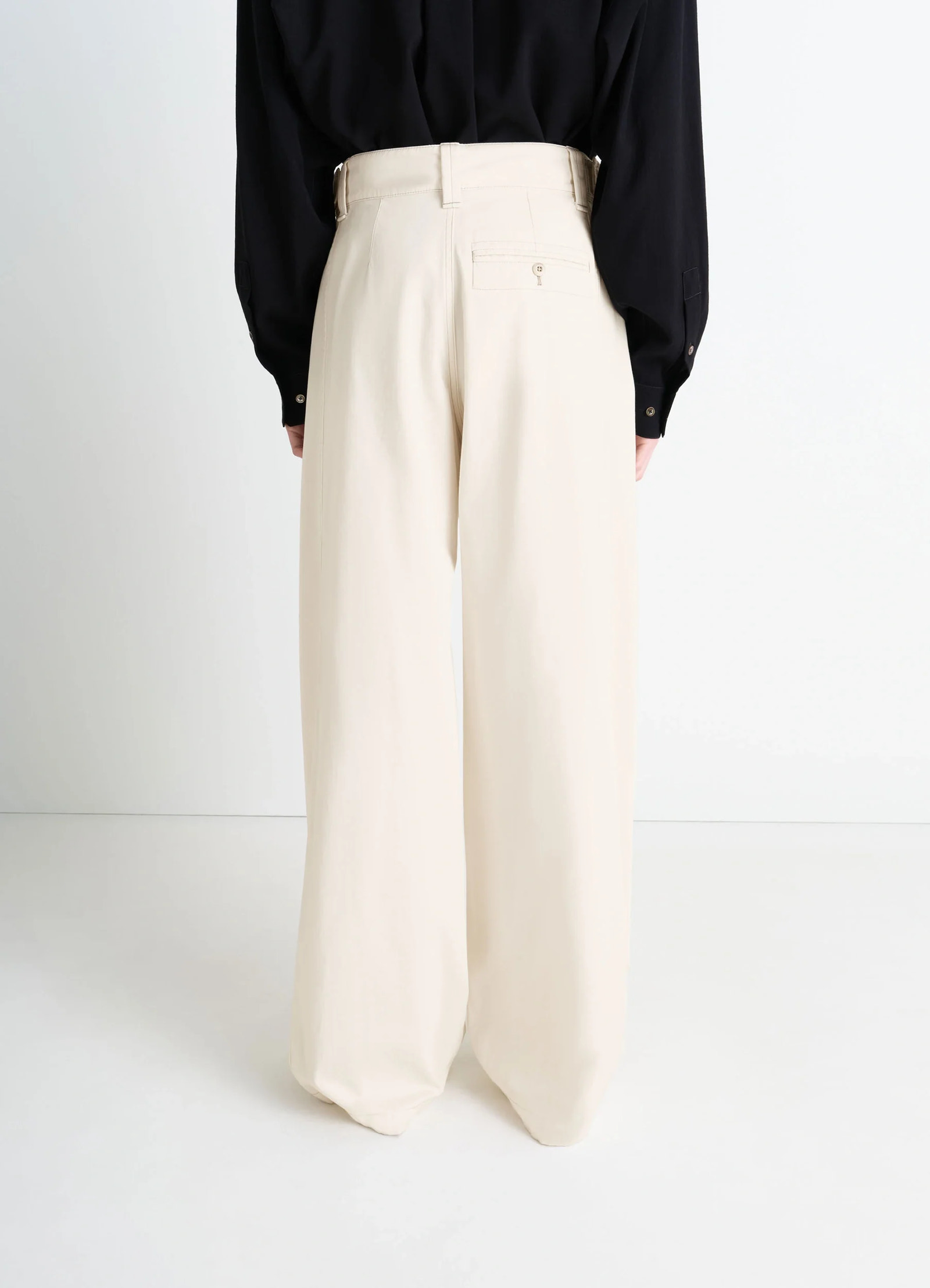 Maxi utility pants in garment dyed compact cotton twill, model shot, rear close-up view high waist back buckle