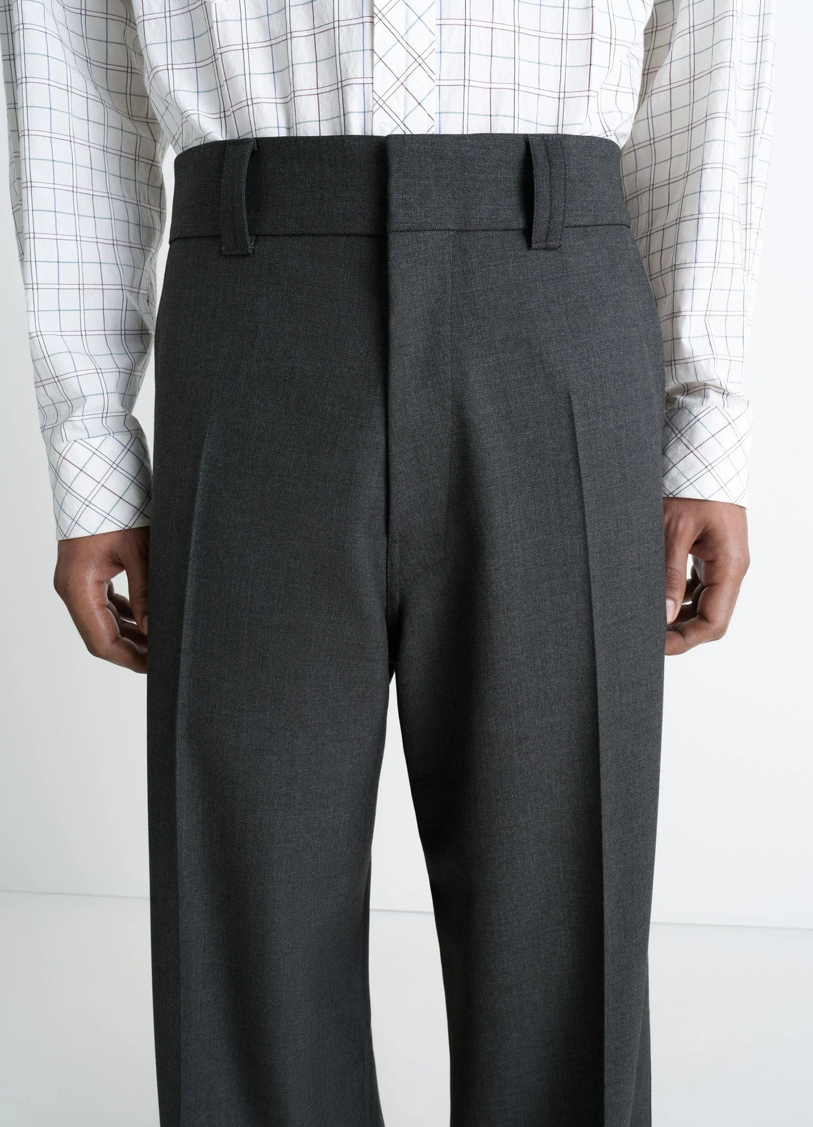 Lemaire straight tailored pants in grey wool-blend suit fabric, model shot, back view pleated high waist