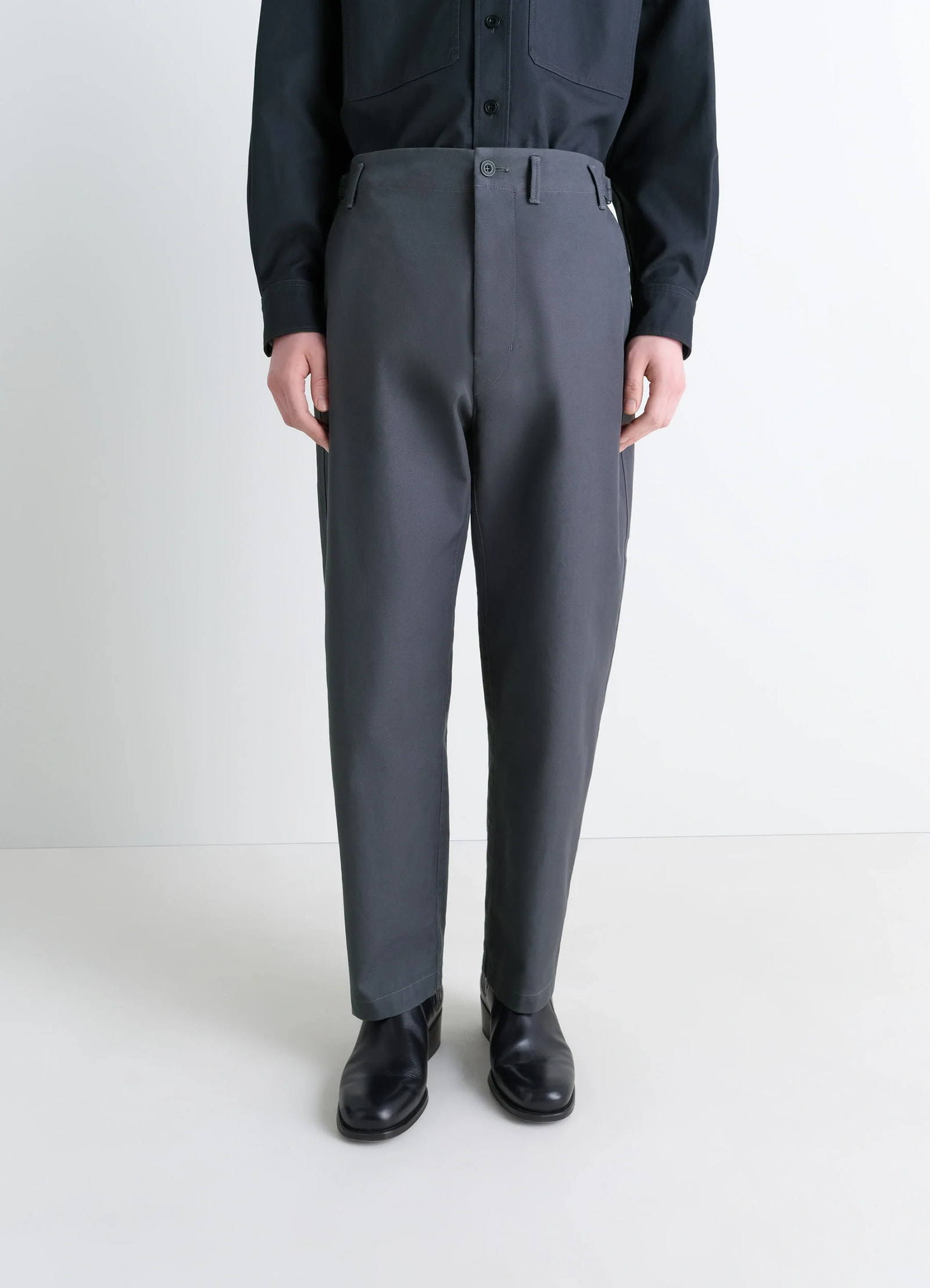 Lemaire carrot pants in thick cotton twill, model shot, side view tapered leg