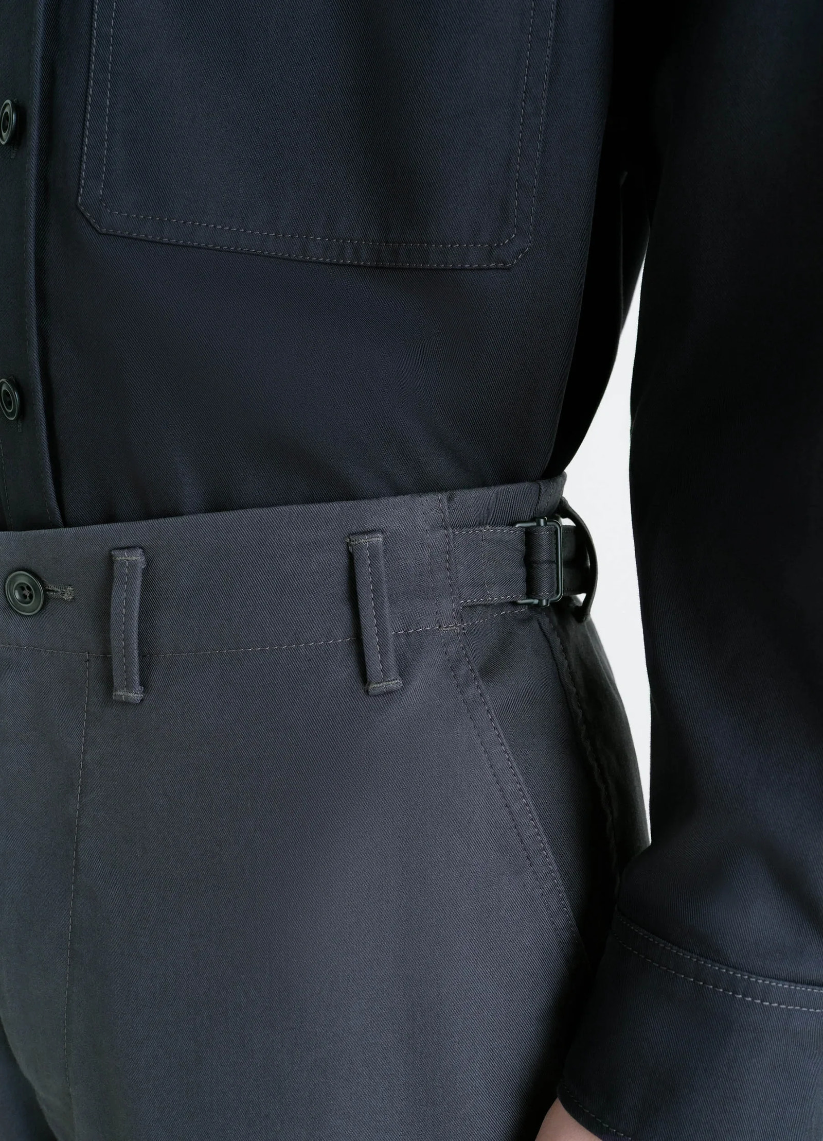 Lemaire carrot pants in thick cotton twill, model shot, waist detail shot adjustable waist straps