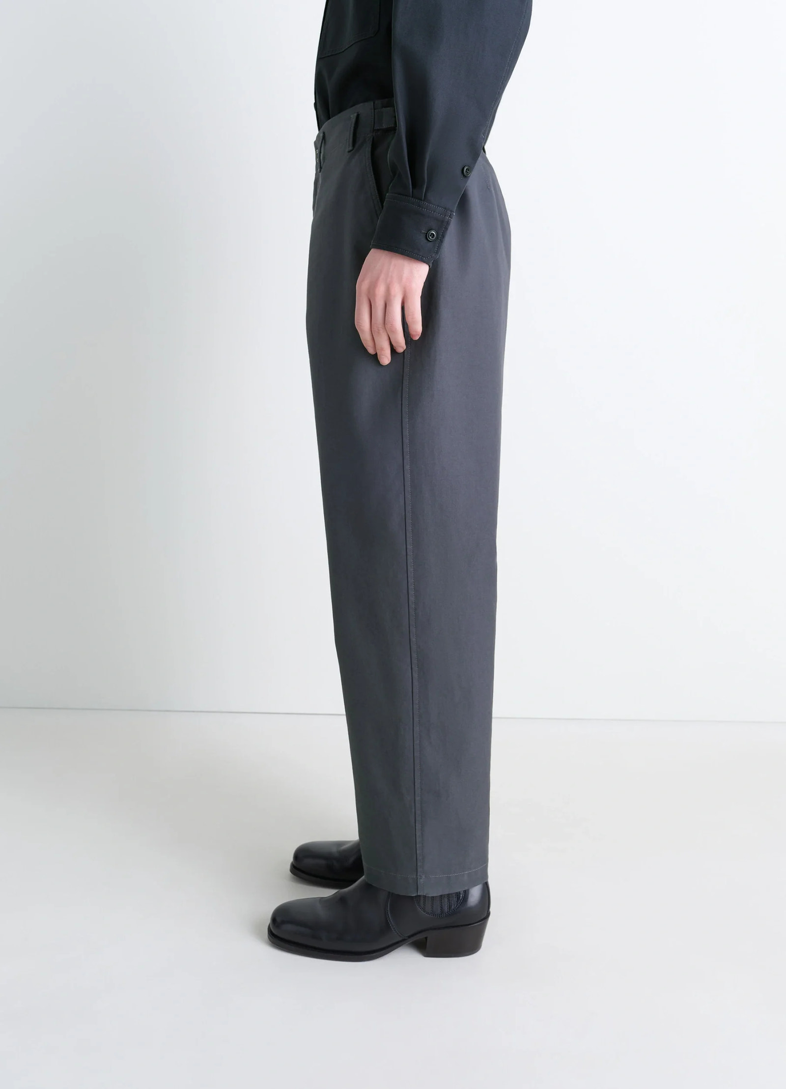 Lemaire carrot pants in thick cotton twill, model shot, slight angle side view straight leg drape