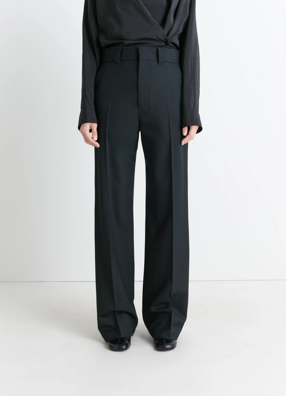 Straight Tailored Pants in Black Wool-Blend, model shot, porte standing view wide leg hem