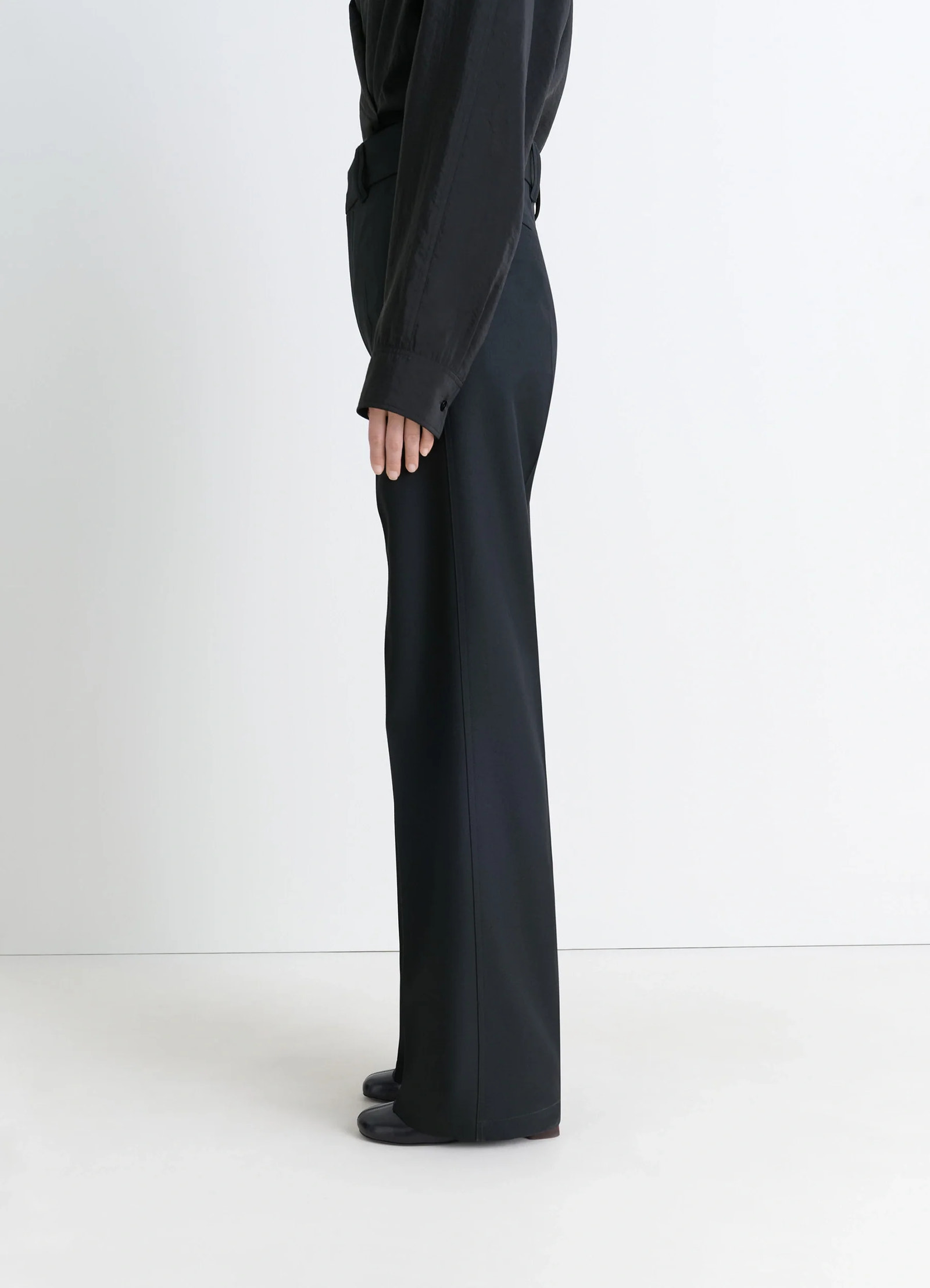 Straight tailored pants in black wool-blend, model shot, side view high waist