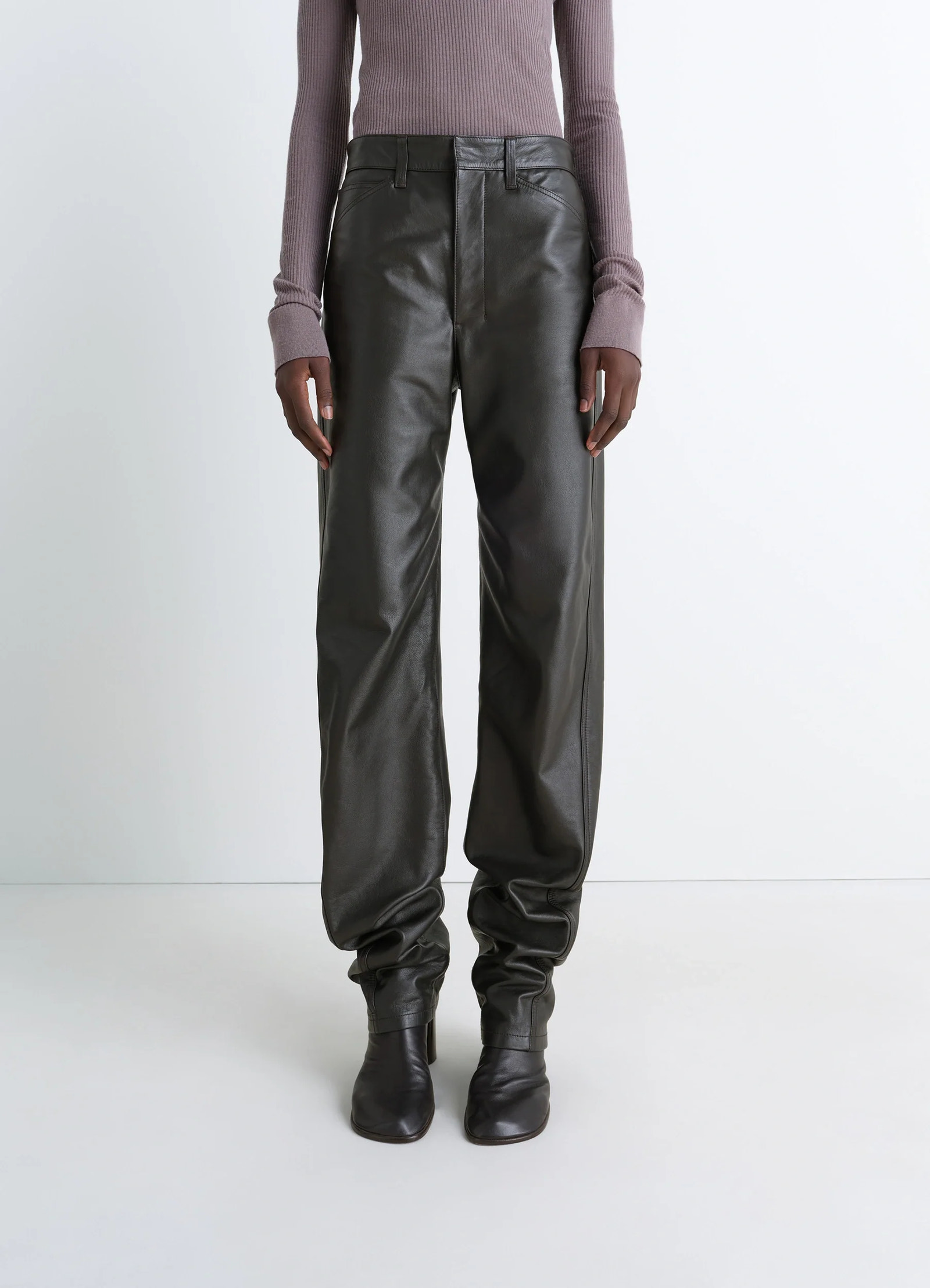 Lemaire leather five pockets twiste in nappa cow leather, model shot, worn by model straight cut with boots