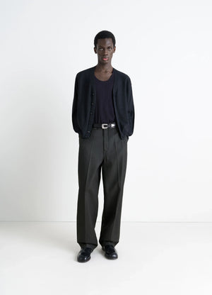 Lemaire Maxi Barrel Workwear Pants in Glossy Coated Denim, model shot, Front view Oversized barrel cut