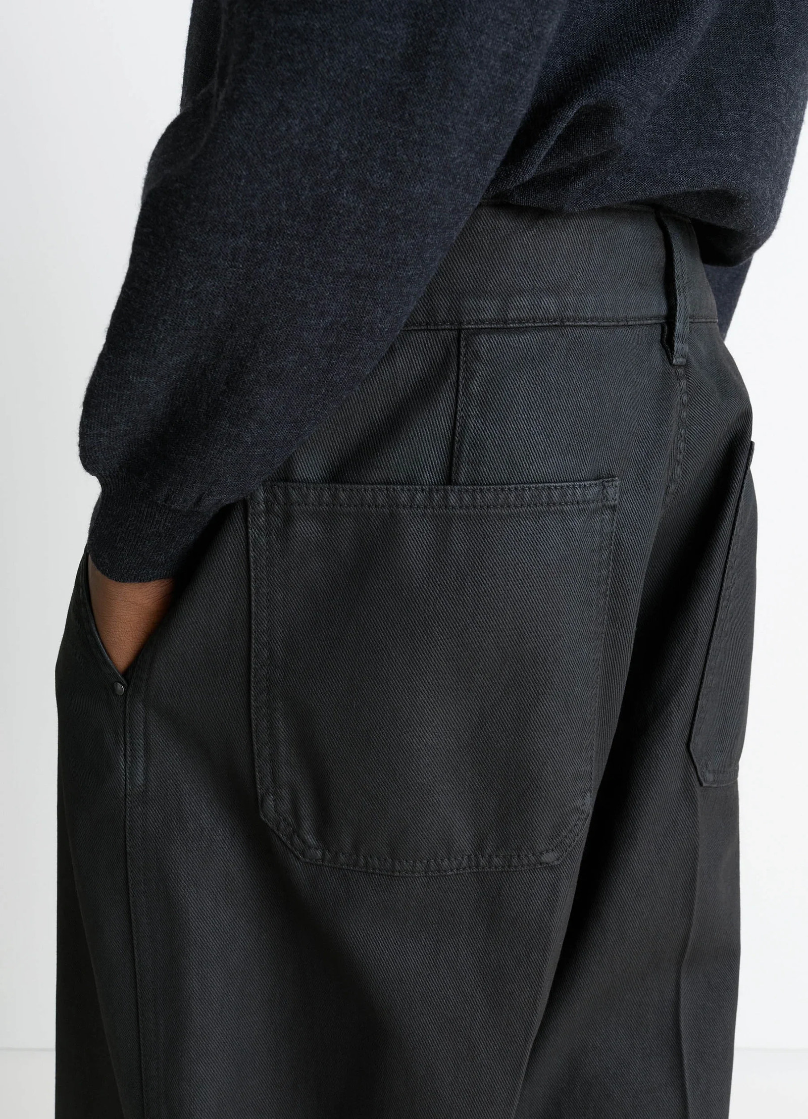 Lemaire maxi barrel workwear pants in glossy coated denim, model shot, side detail shot back pockets detail