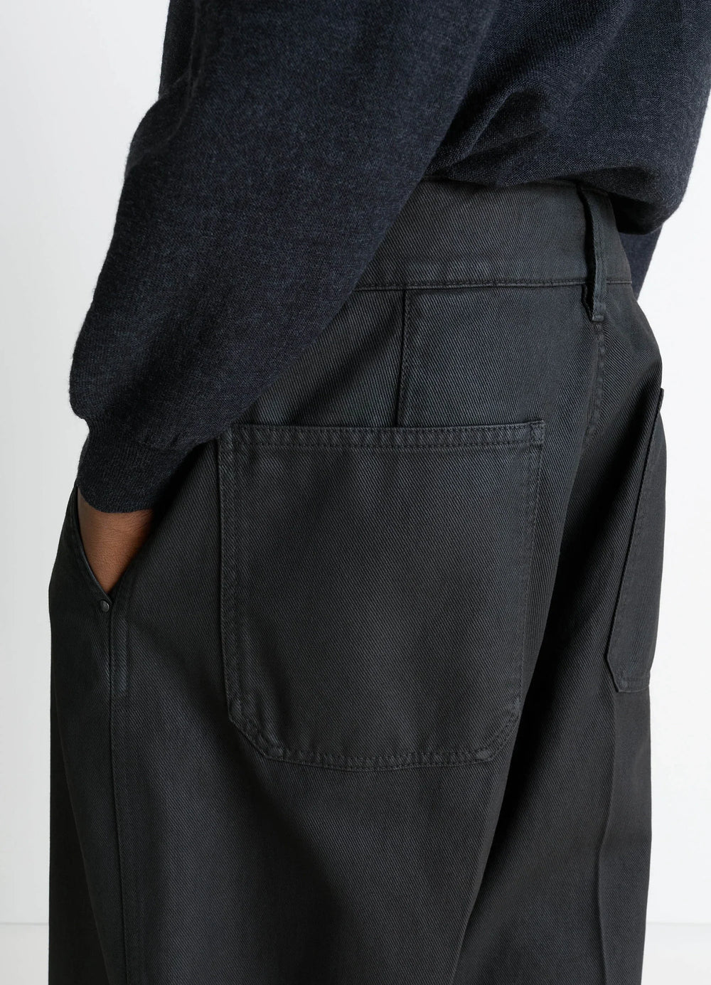 Lemaire Maxi Barrel Workwear Pants in Glossy Coated Denim, model shot, side detail shot back pockets detail