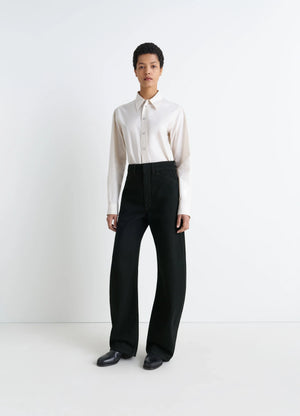 Lemaire High Waisted Curved Pants in Deep Black Thick Denim, model shot, front view rounded cut wide leg