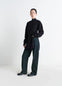 Lemaire High Waisted Curved Pants in Deep Indigo Thick Denim, model shot, front view rounded cut wide leg