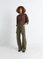 Lemaire High Waisted Curved Pants in Heather Garment Dyed Snow Denim, model shot, front view rounded cut, wide leg