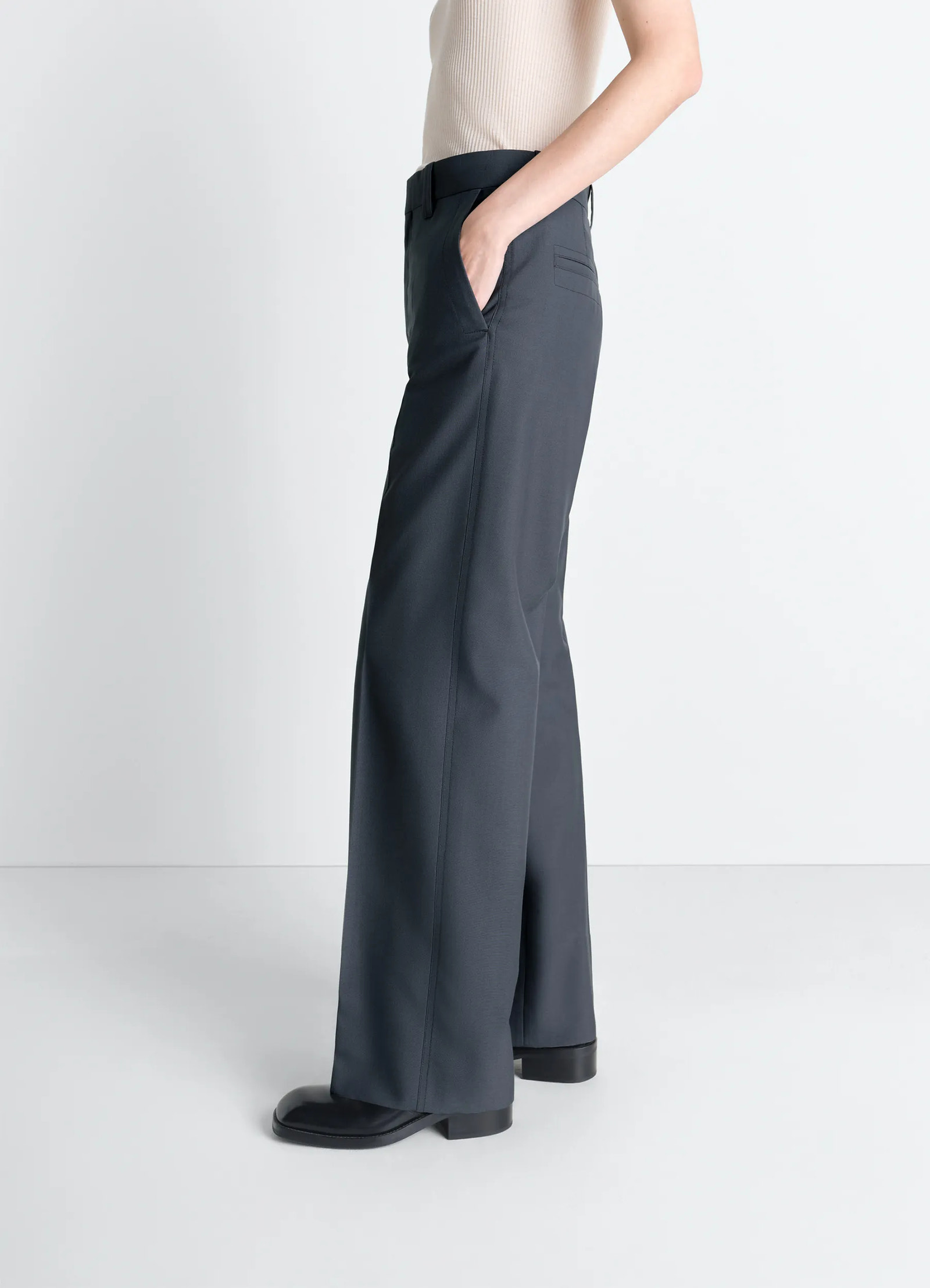 Straight tailored pants in polywool, model shot, profile view high waist profile fit