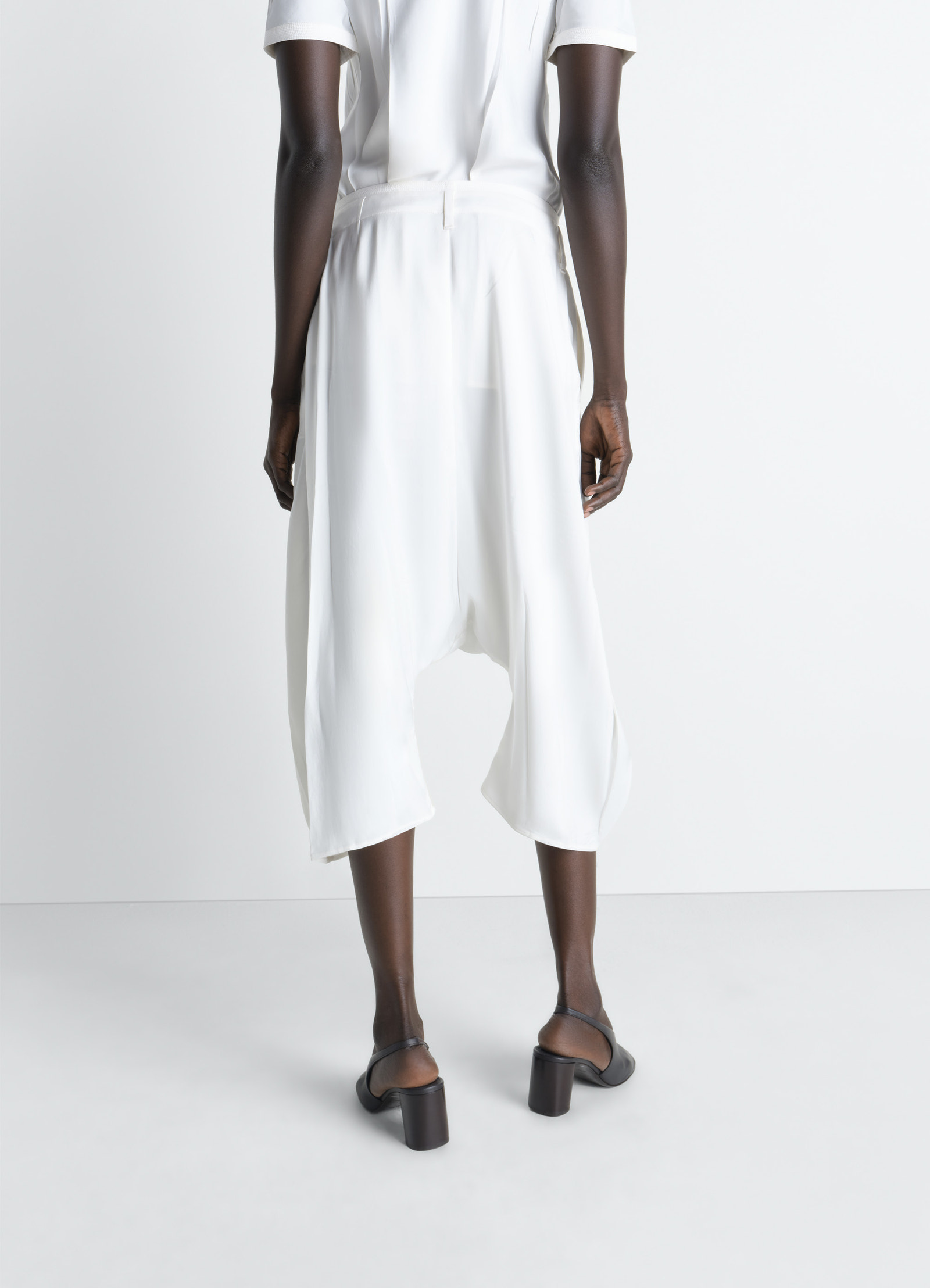 Creased dropped crotch bermudas in poly viscose twill