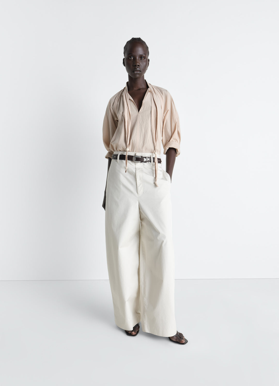 Lemaire Large Chino Pants in Cotton Twill, model shot, Front view Oversized cut