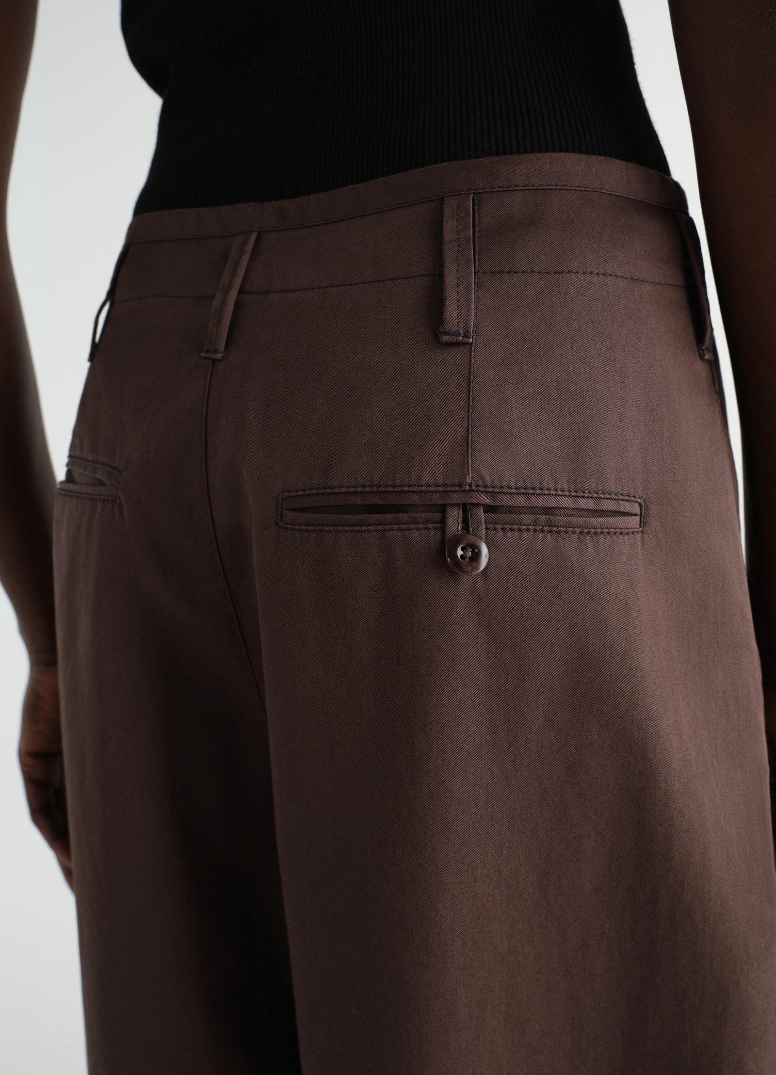 Lemaire large chino in brown cotton twill, model shot, back detail view welt pockets
