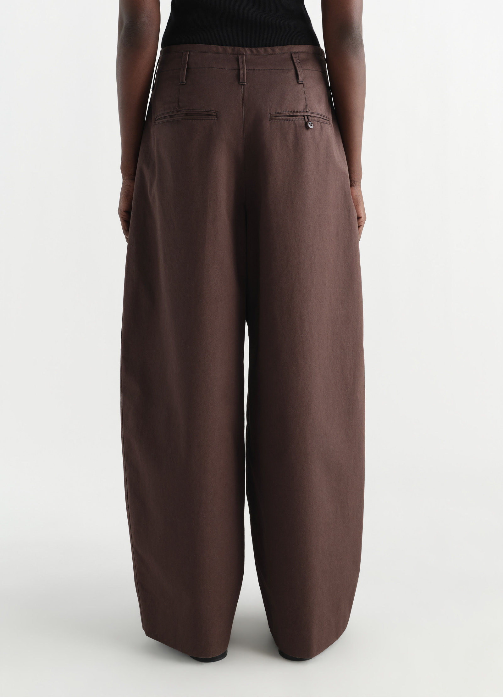 Lemaire large chino in brown cotton twill, model shot, back view relaxed fit