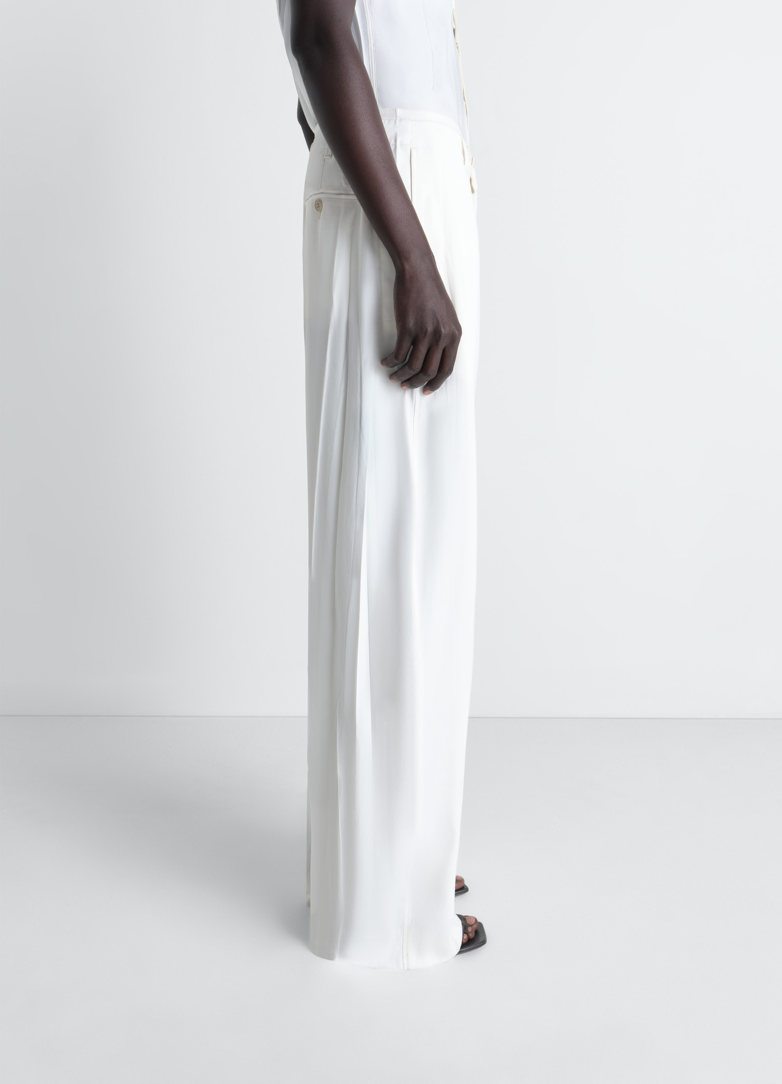 Creased soft pants in poly viscose twill, model shot, back side view high waist fit