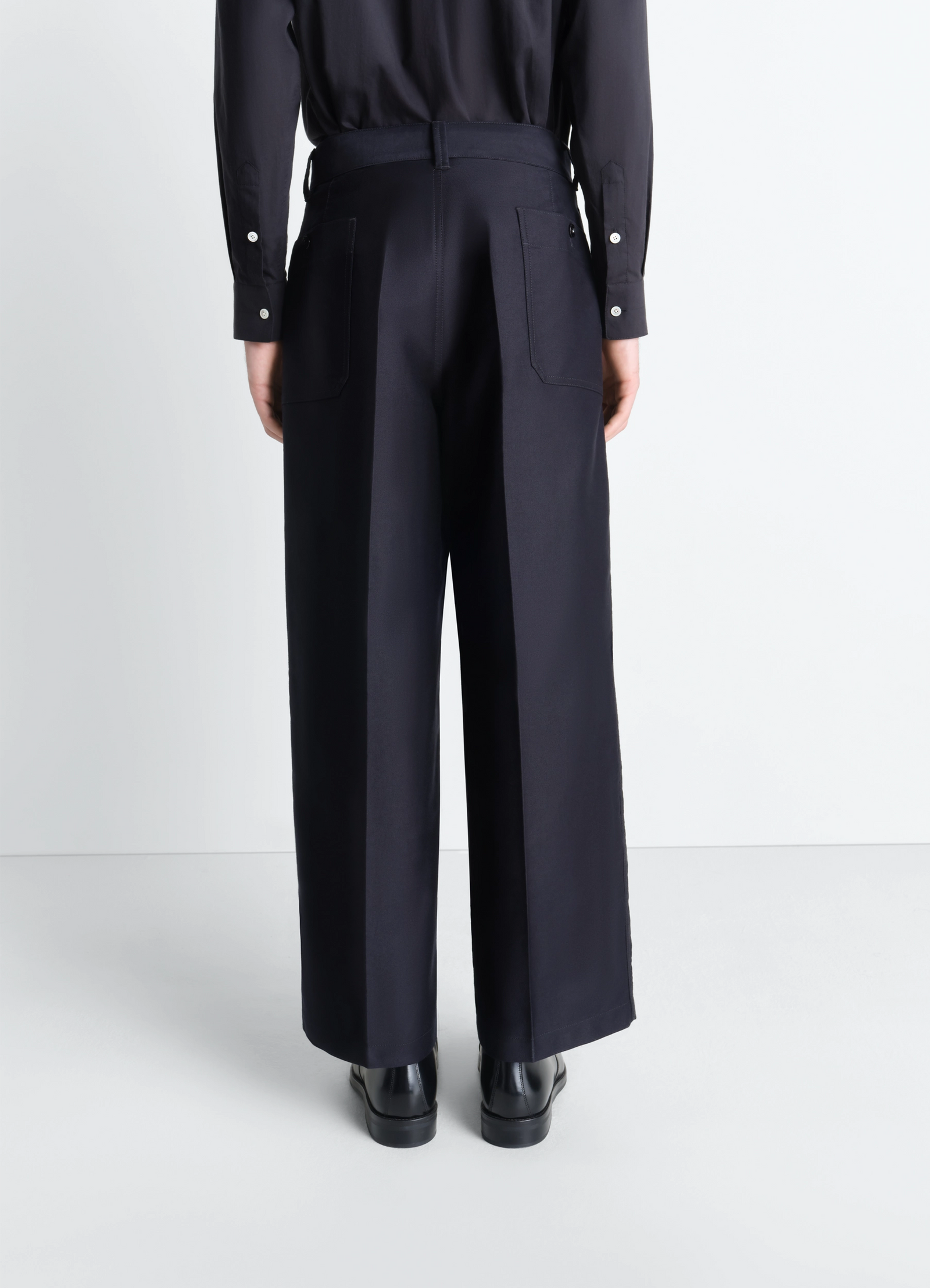 Lemaire wide workwear pants in cotton satin, model shot, back view rear wide leg seam