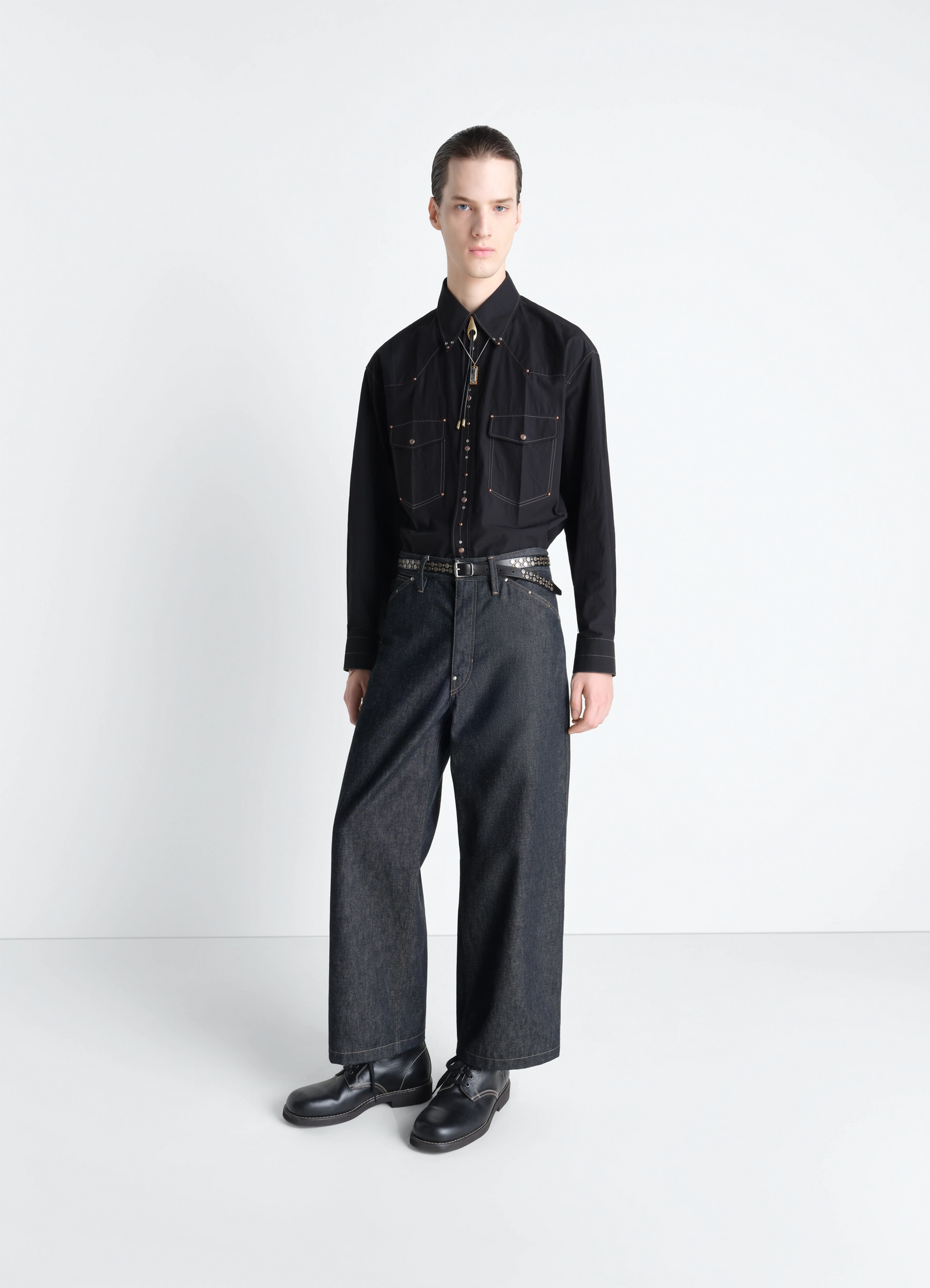 Lemaire wide pant with studs in slate denim, model shot, front view wide leg