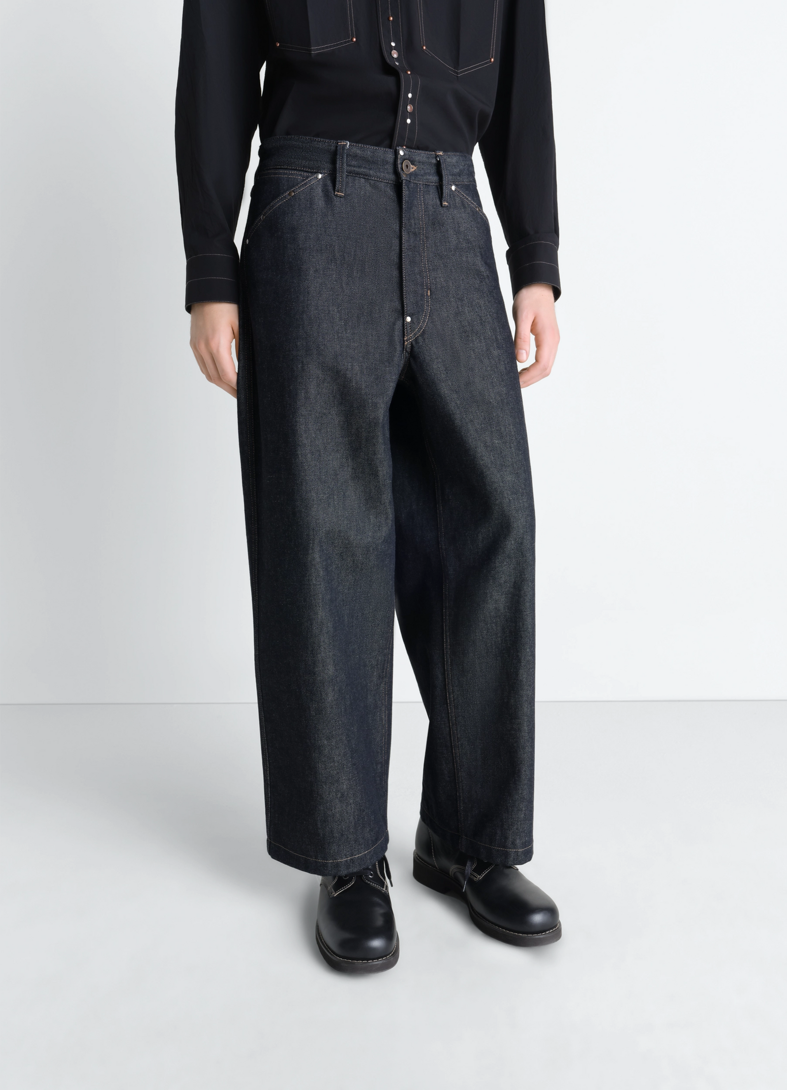 Lemaire wide pant with studs in slate denim, model shot, side view high rise