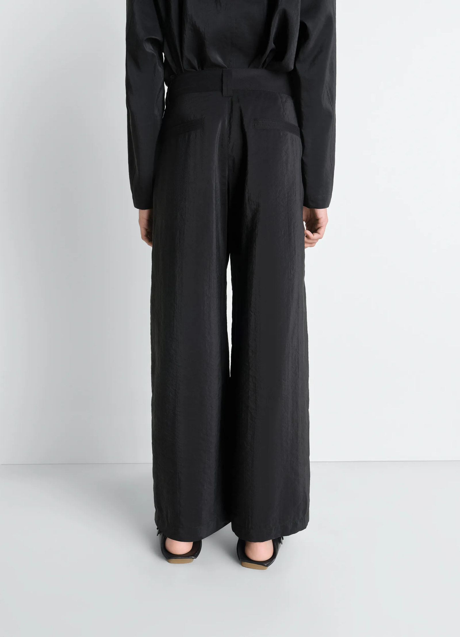 Straight tailored pants in dry silk, model shot, back view wide leg tailored