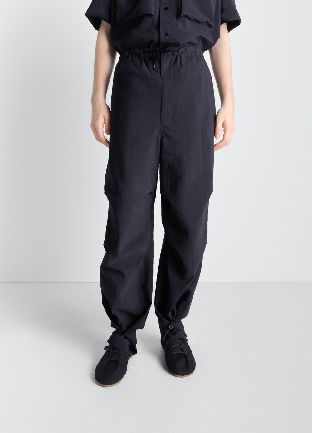 Parachute Pants in Washed Technical Cotton, model shot, back view elastic waist tie detail