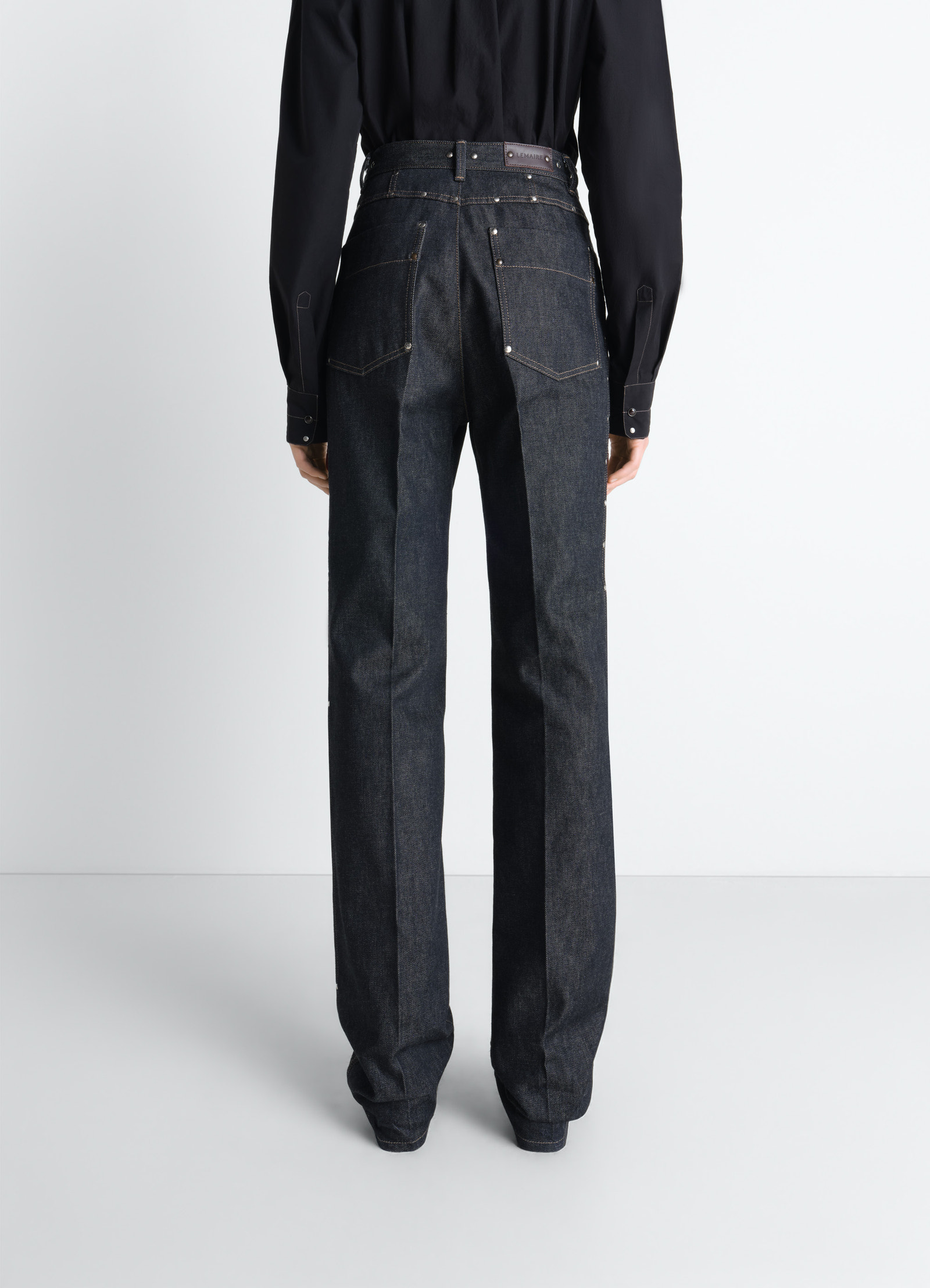High waisted straight pants with st in slate denim, model shot, back full-figure view belt loops, cuff detail