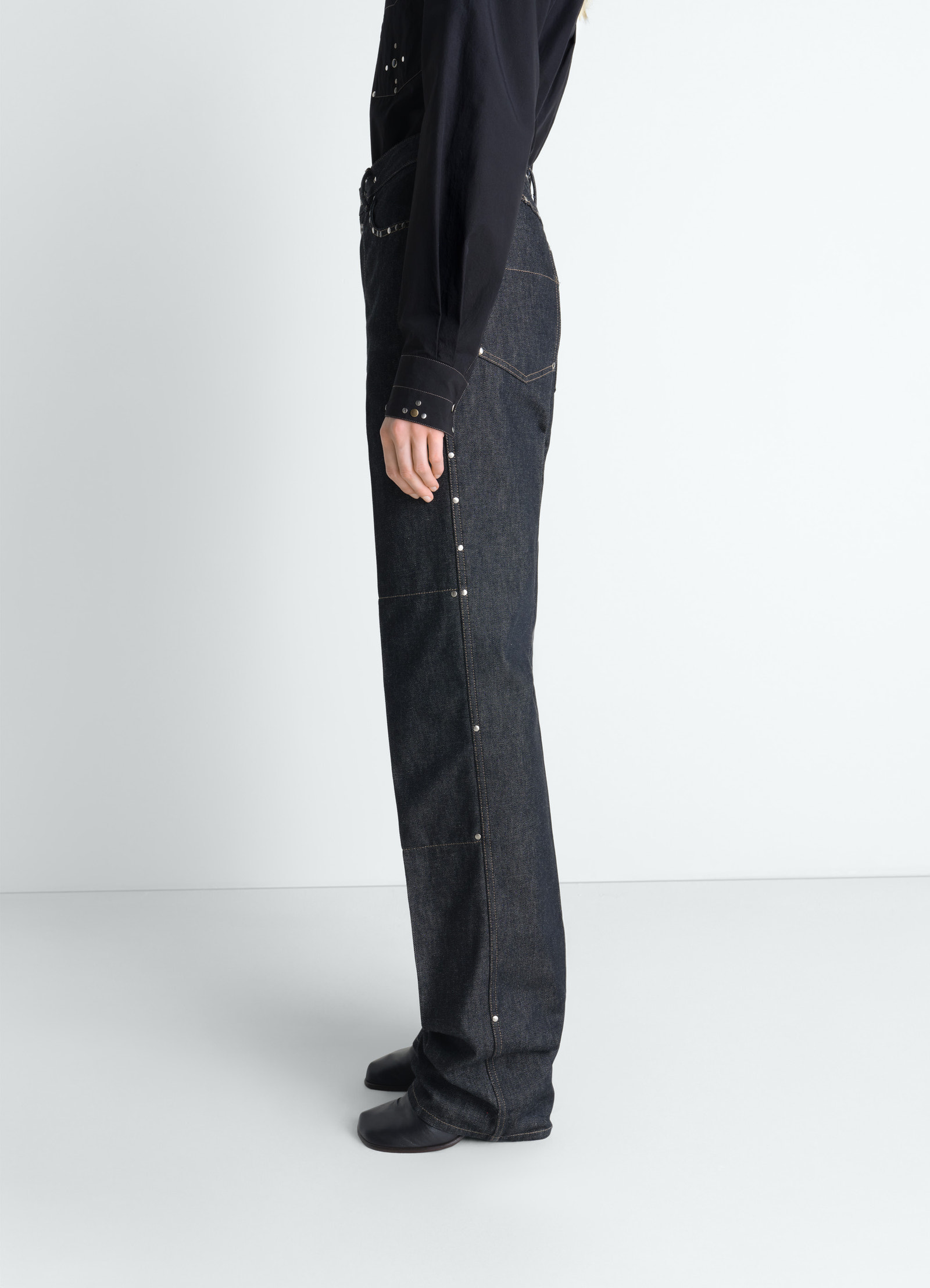 High waisted straight pants with st in slate denim, model shot, side view straight leg profile