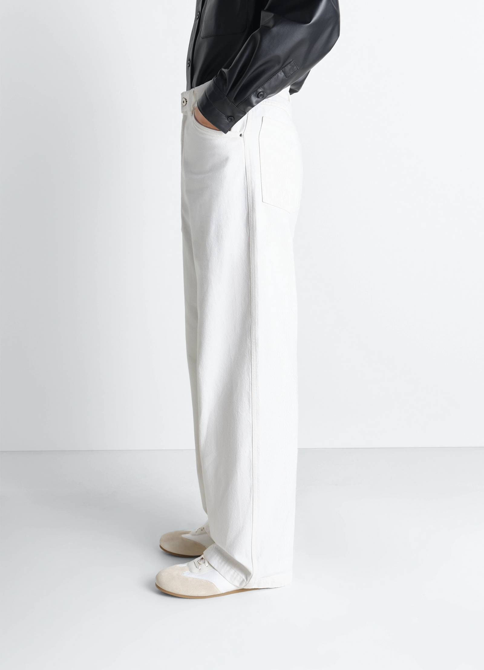 Lemaire wide pants in denim in bleached denim, model shot, worn left side view side pocket detail