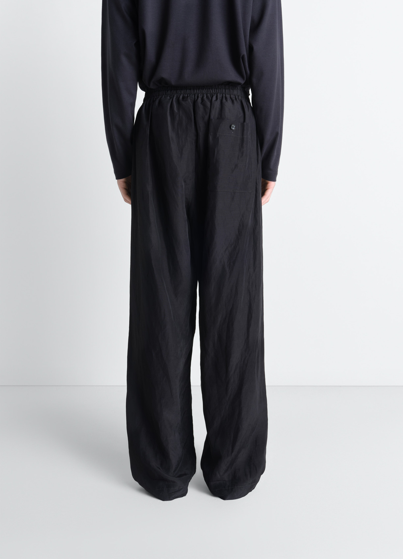 Lemaire pyjama pants in black linen viscose, model shot, back view loose fit, back pocket
