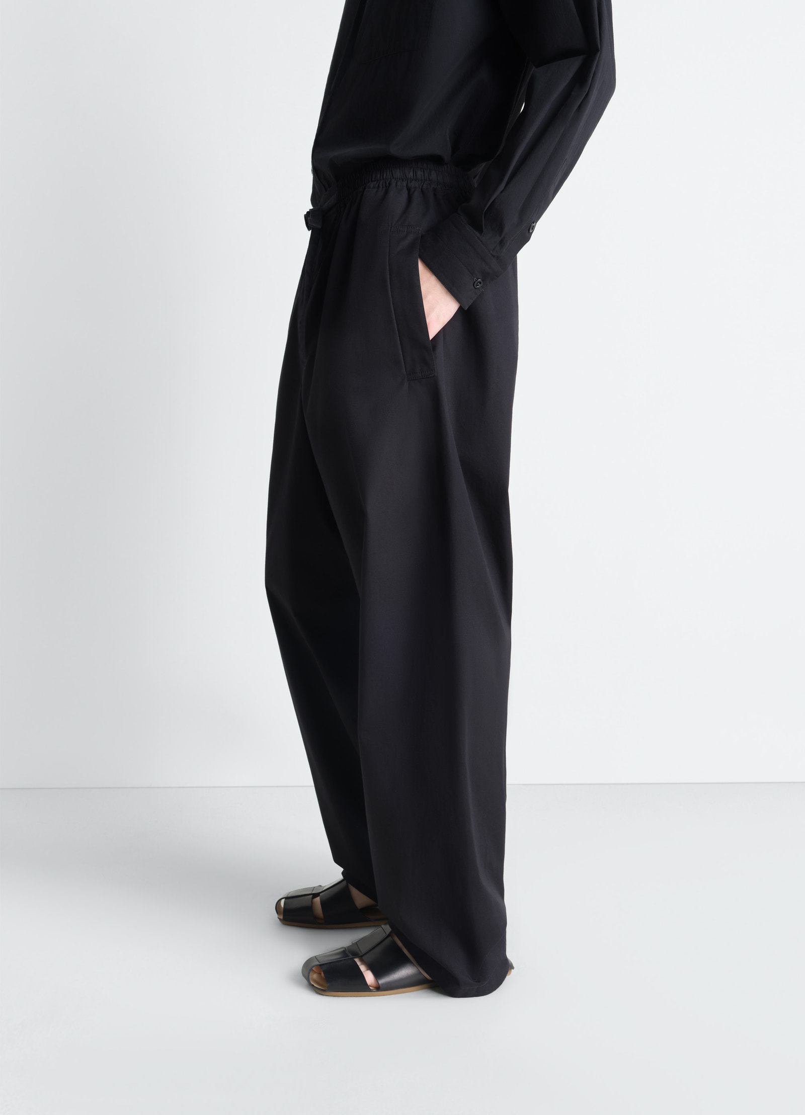Lemaire pyjama pants in light cotton twill, model shot, side view elastic waist