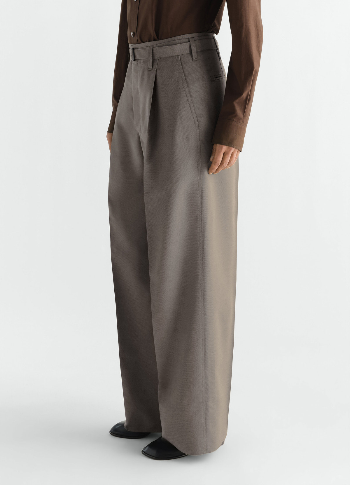 Wide pleated wool and mohair pants in taupe worn by model front view lemaire