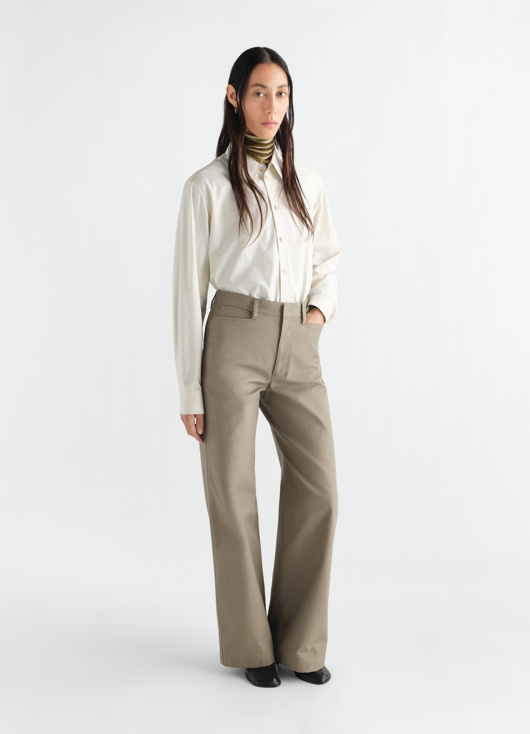 Straight taupe heavy cotton twill pants worn by a model in front, LEMAIRE